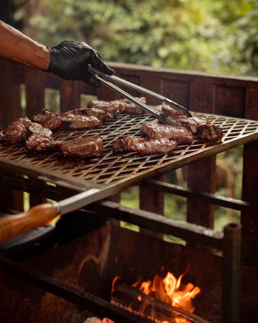 Meat on the grill over an open fire